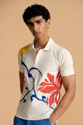 Floral Burst Resort Polo – close-up of floral artwork and polo collar | Shivan & Narresh