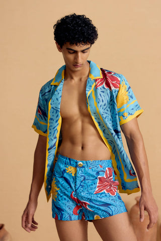 Maurice Swim Shorts – model wearing printed swim shorts | Shivan & Narresh
